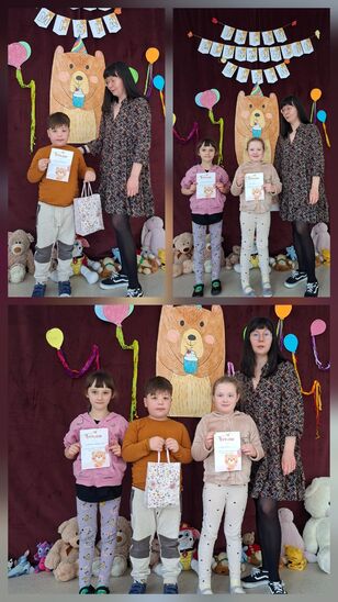 dzieci w towarzystwie nauczycielki, w rece mają upominki oraz dyplomy za udział w konkursie